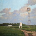 a dirt path leads off to the horizon where a white house with several archways at the entry, along the path a water tank with the King Ranch running 