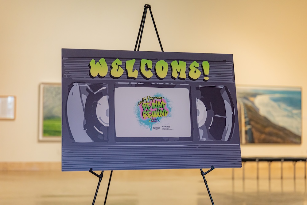a welcome sign shaped like a VHS tape welcomes guests